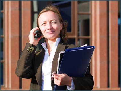 a business woman talking on a cell phone