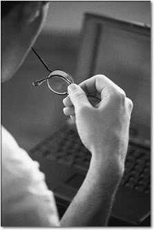 man working in front of a laptop