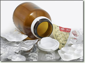 Empty pill bottle and blister packs