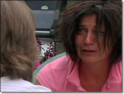 Photo of a responder listening to a person in crisis.