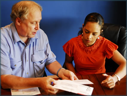 case manager helping Maria with her mail