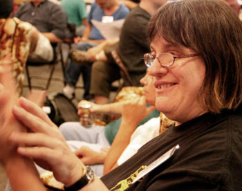 DeafBlind woman signing with her SSP