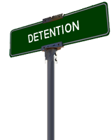 A street sign that reads detention.