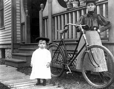 Family with bicycle.